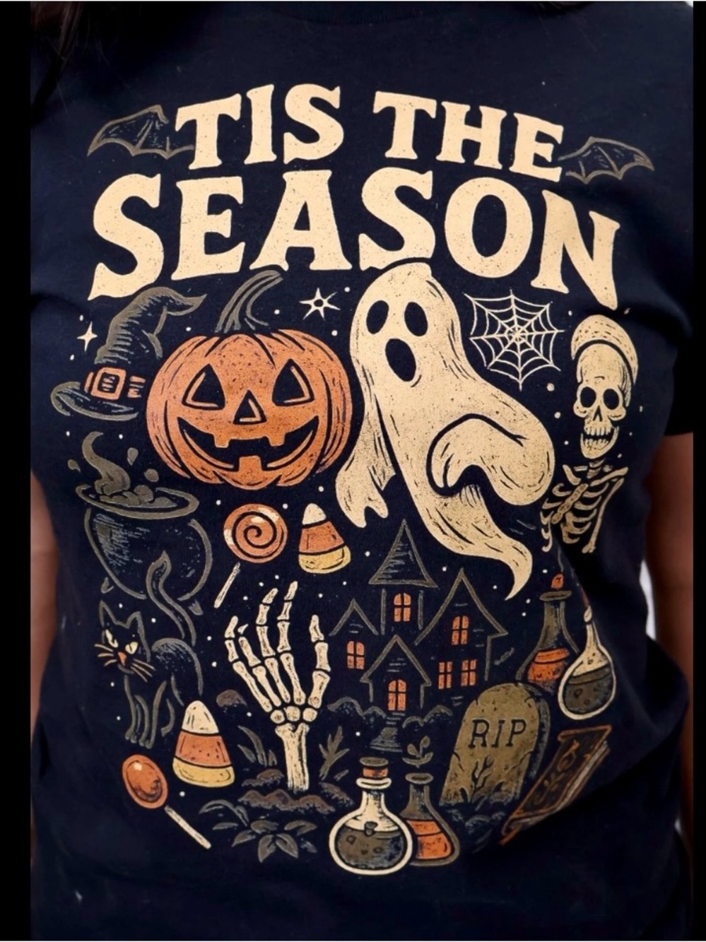 This is a retro-style "Tis the Season" Halloween graphic t-shirt
